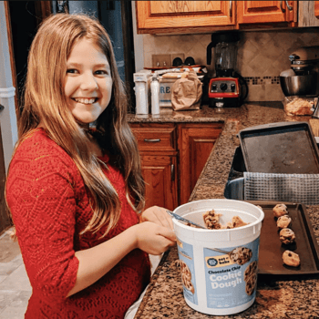 Food Traditions - Megan Brewer - daughter making cookies_Instagram 